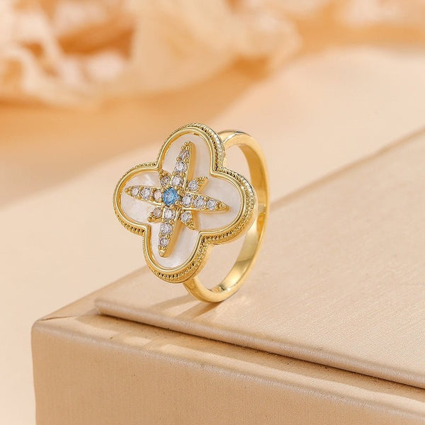 Golden clover azure ring
