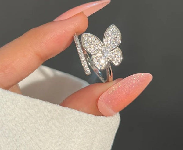 Magic butterfly adjustable ring