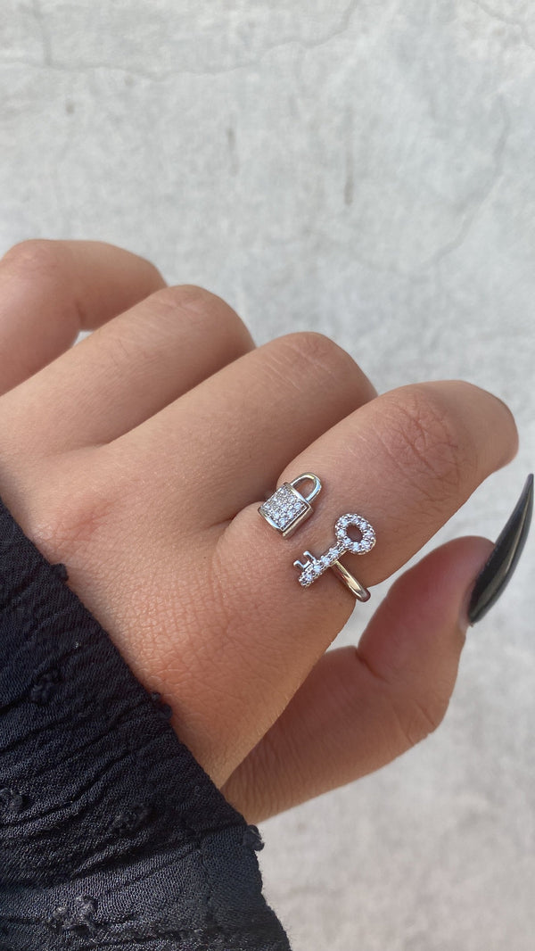 Lock and key adjustable ring