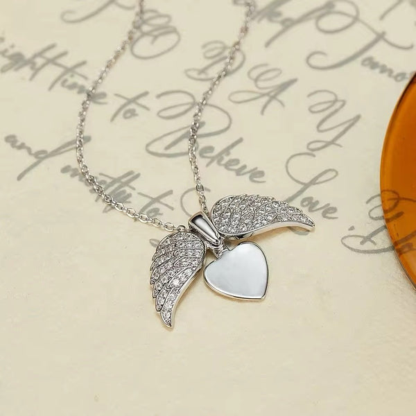 Stainless steel angel wings open heart necklace
