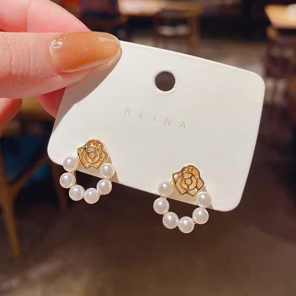 Golden rose flower stud earrings