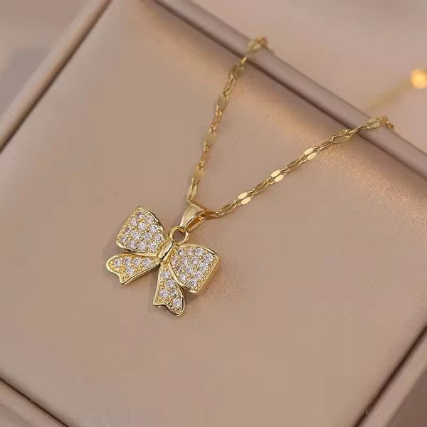 Stainless steel gold plated bow necklace