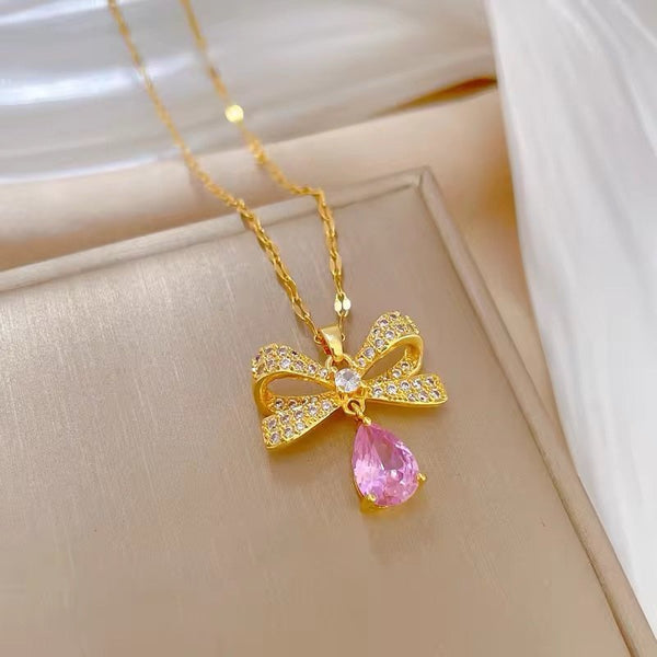 Stainless steel bow hanging necklace