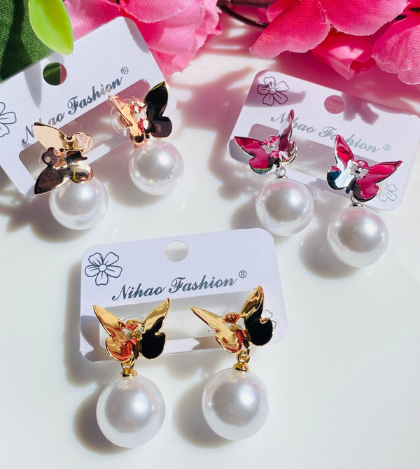 Metal butterfly with hanging pearl drop earrings